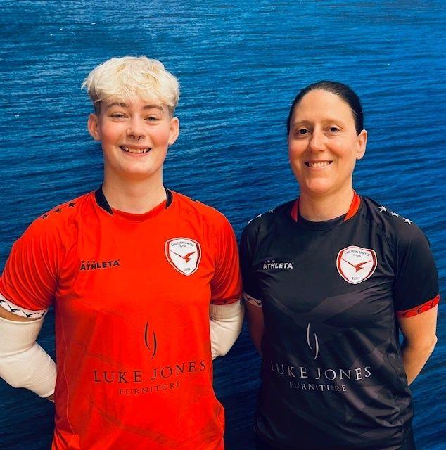 Two team members celebrating