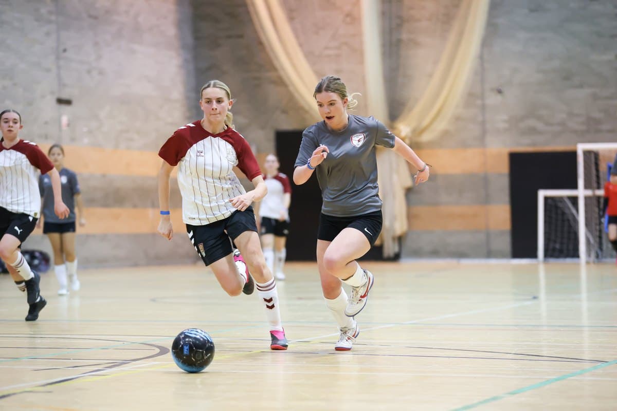 Chiltern Futsal players competing for the ball